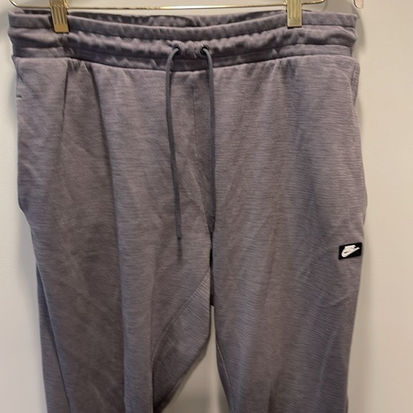 Two t shirts xl and xxl and one Nike sweatpants xl. - Picture 9 of 14
